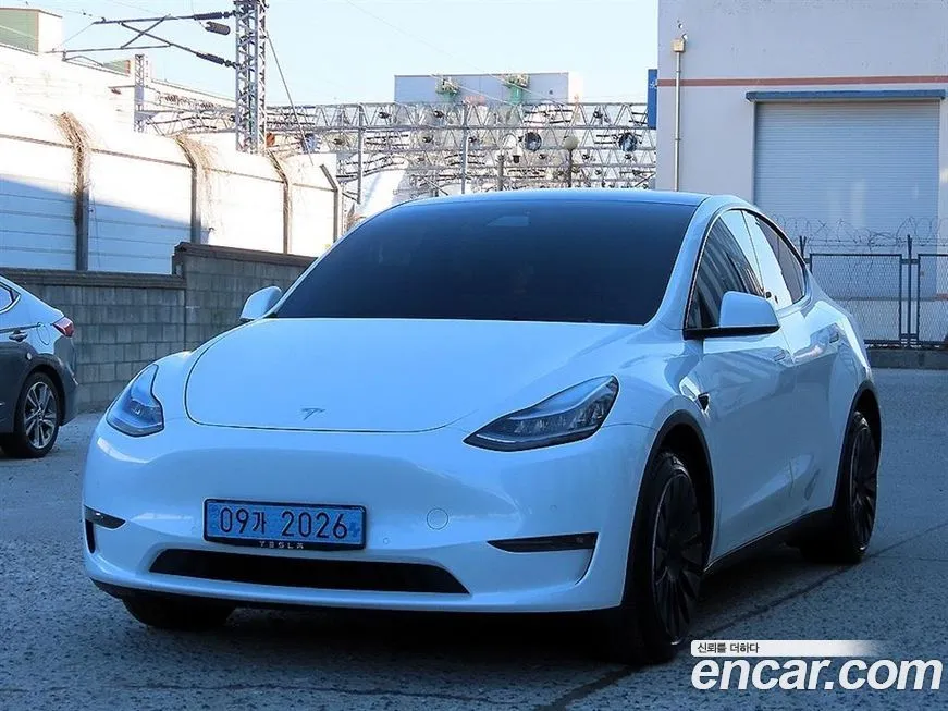 Tesla Model Y — фото 9