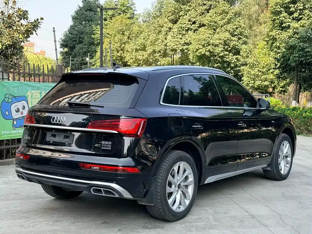 Audi Q5L — фото 5