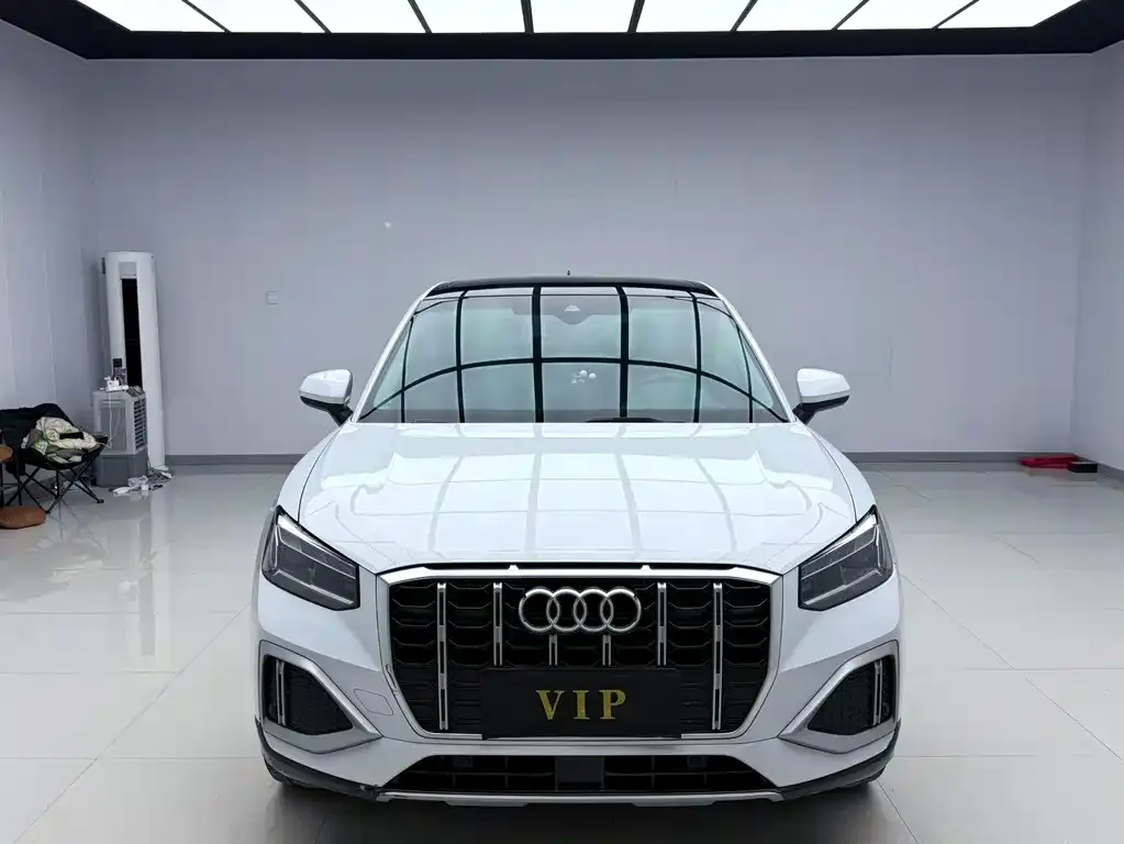 Audi Q2L — фото 8