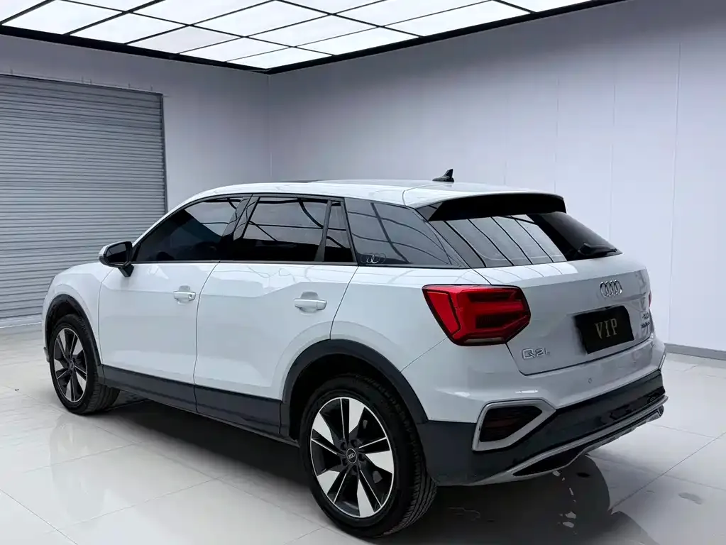 Audi Q2L — фото 5