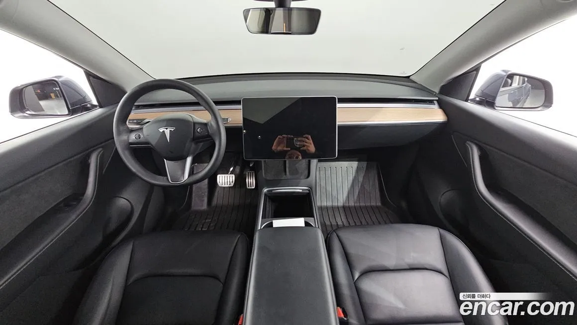 Tesla Model Y — фото 10