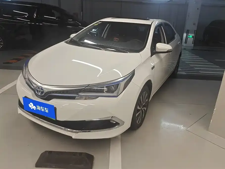 Toyota Corolla Hybrid — фото 1