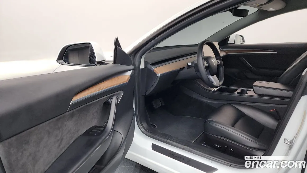 Tesla Model 3 — фото 9