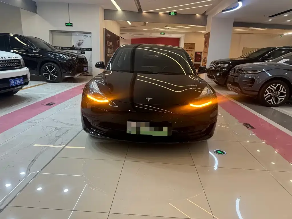 Tesla Model 3 — фото 7