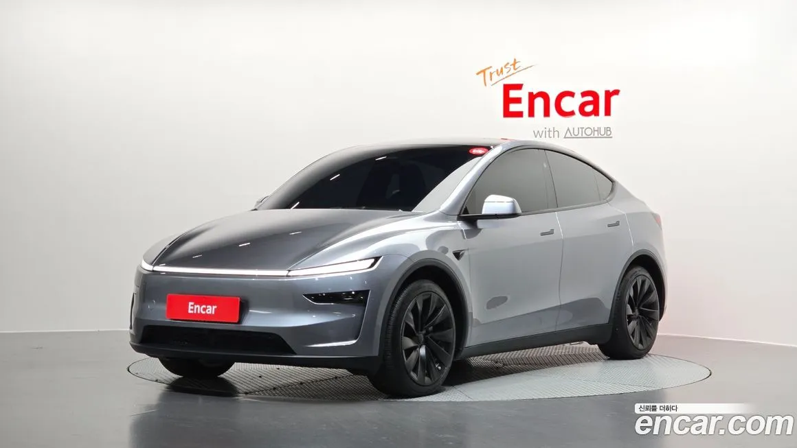 Tesla Model Y — фото 1