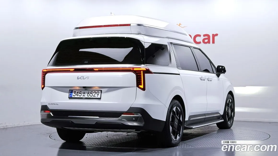 Kia Carnival — фото 10