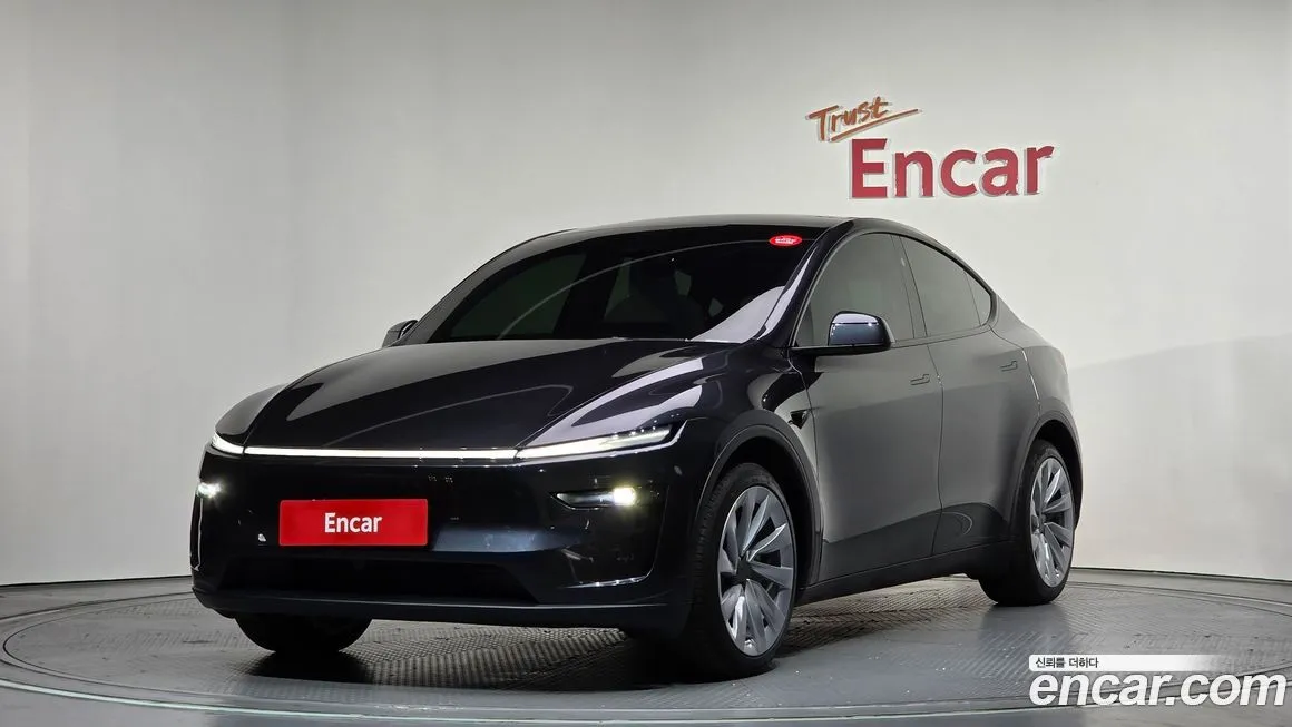 Tesla Model Y — фото 1