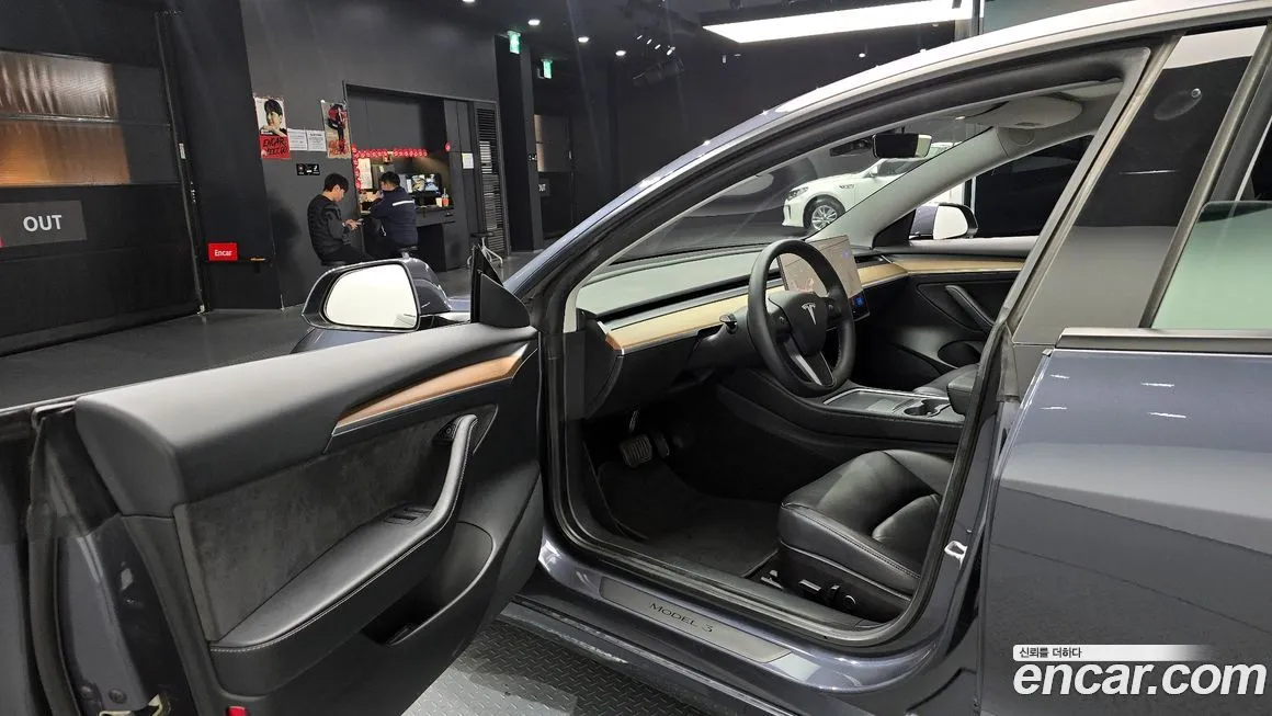 Tesla Model 3 — фото 7