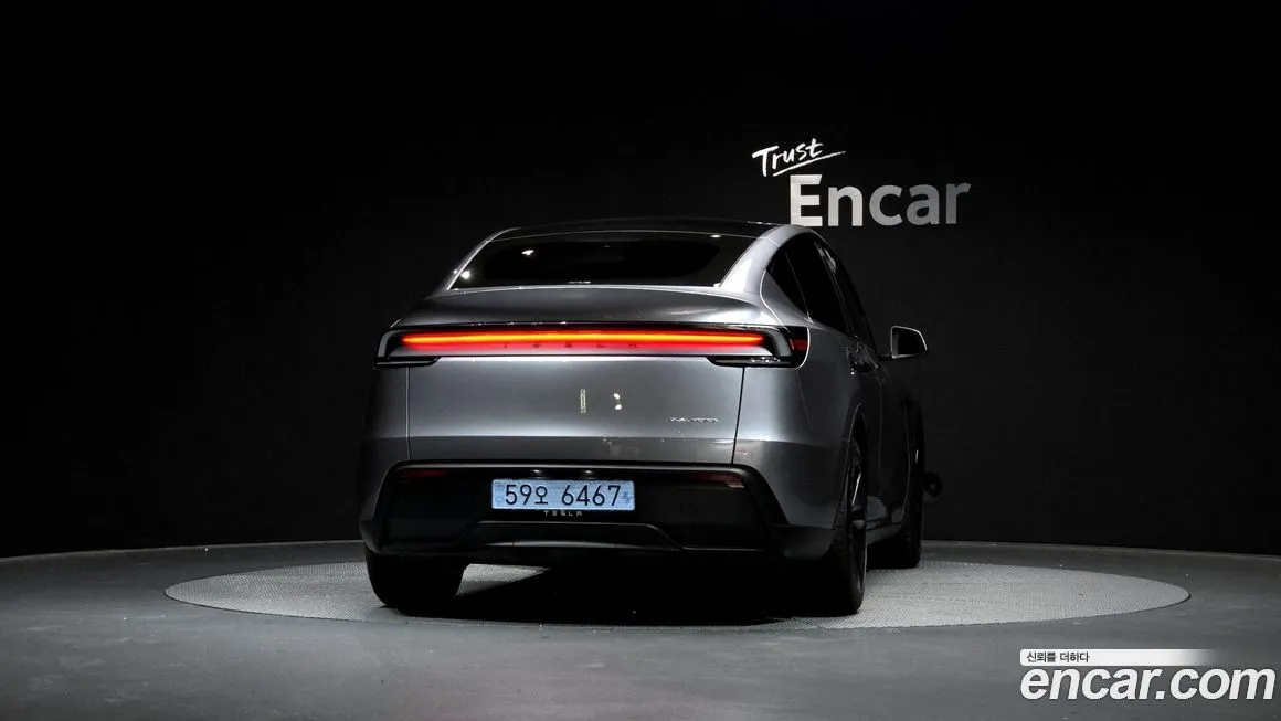 Tesla Model Y — фото 10