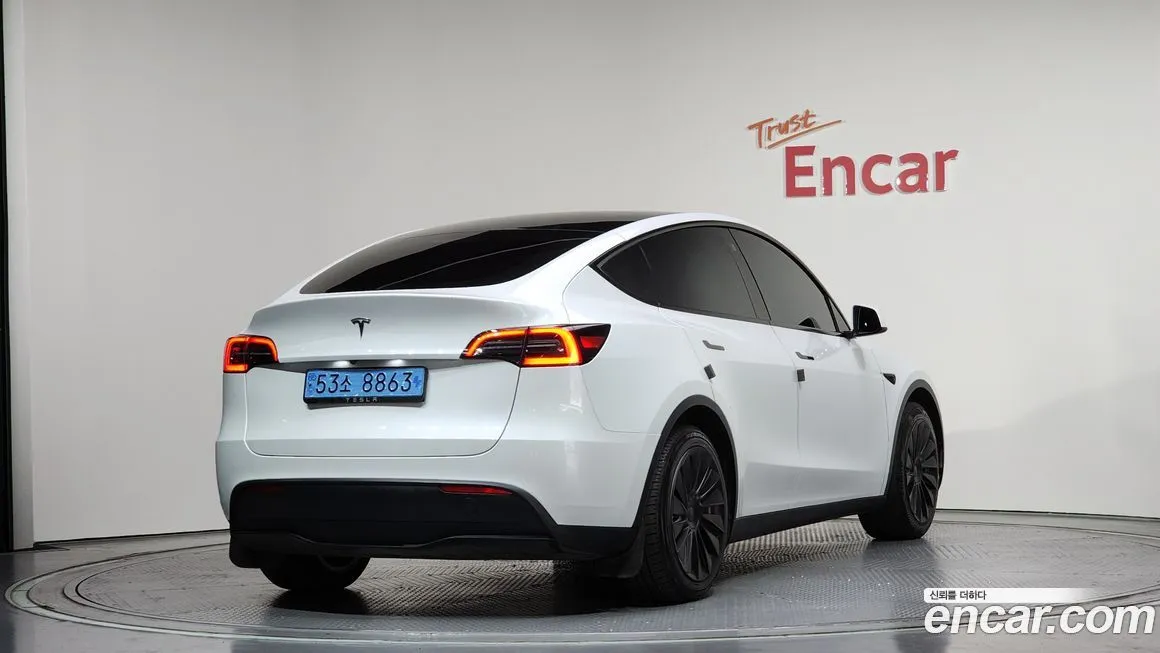 Tesla Model Y — фото 6