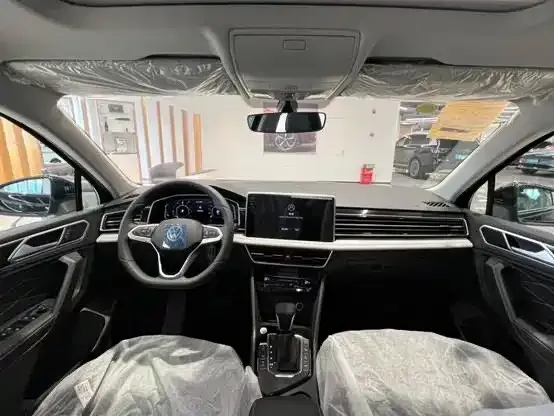 Volkswagen Tiguan L New Energy — фото 3