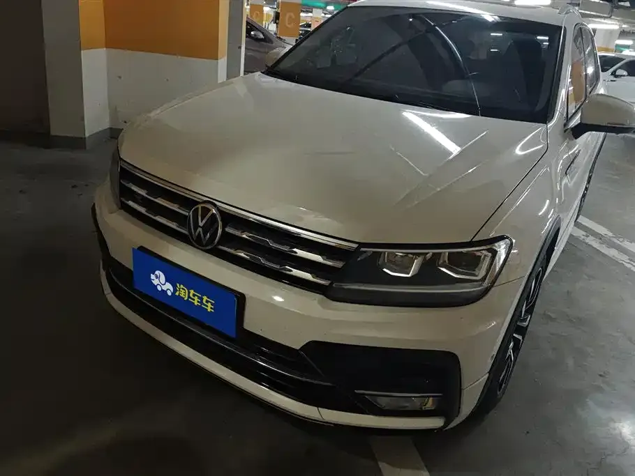 Volkswagen Tiguan L — фото 1