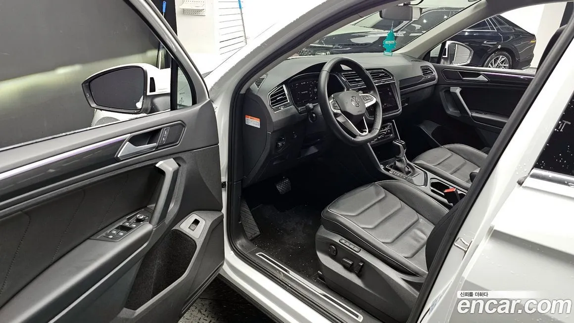 Volkswagen Tiguan — фото 10