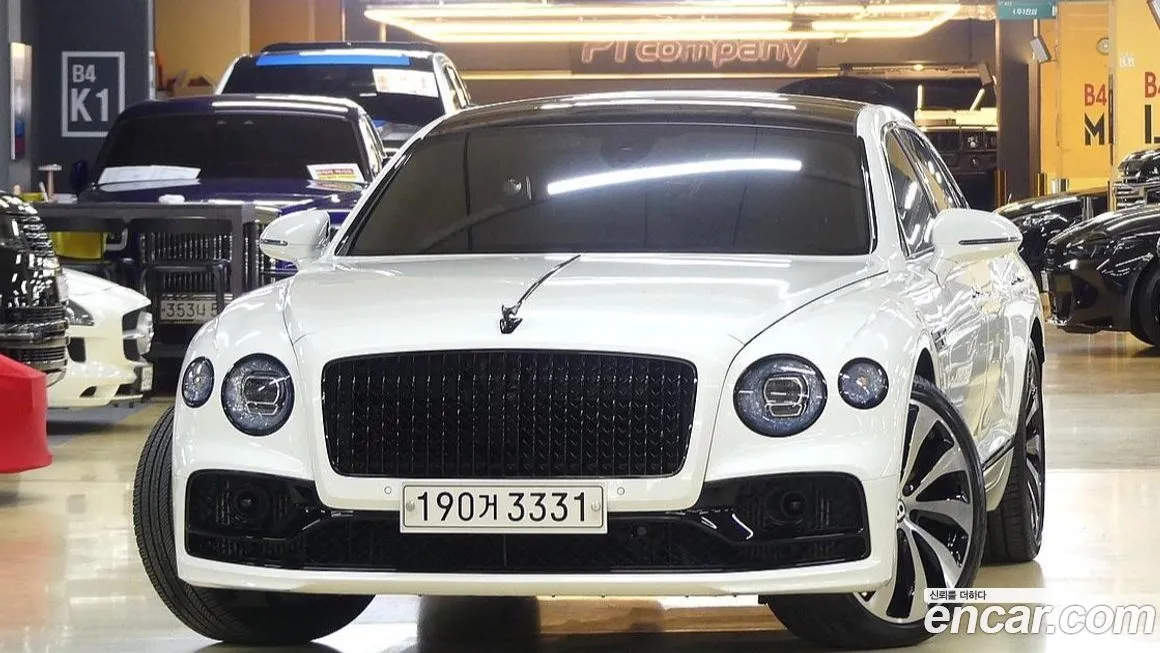 Bentley Flying Spur — фото 1