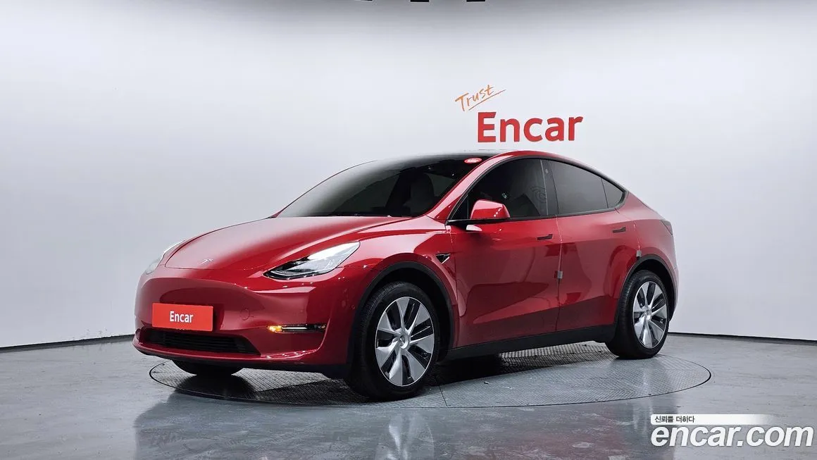 Tesla Model Y — фото 1