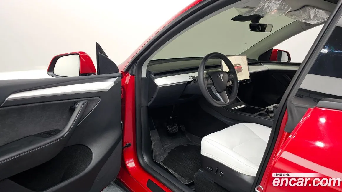 Tesla Model Y — фото 9