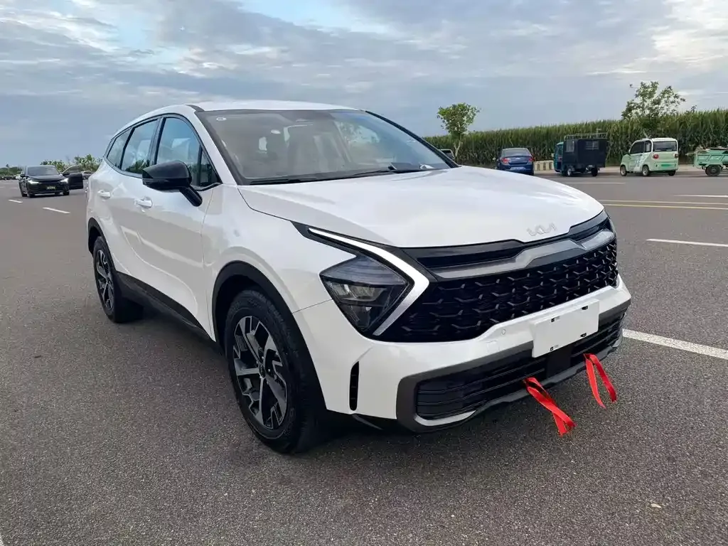 Kia Sportage — фото 7