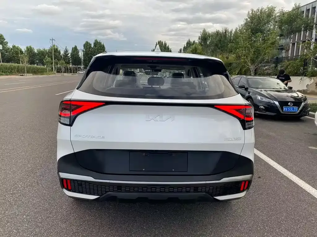 Kia Sportage — фото 6