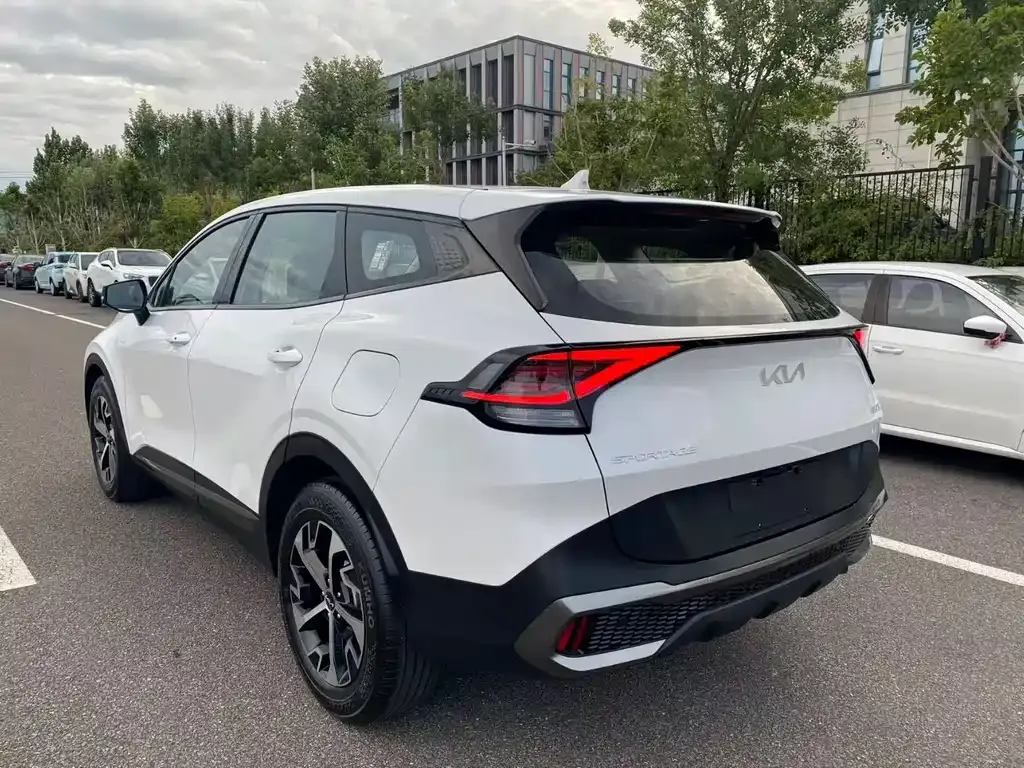 Kia Sportage — фото 9