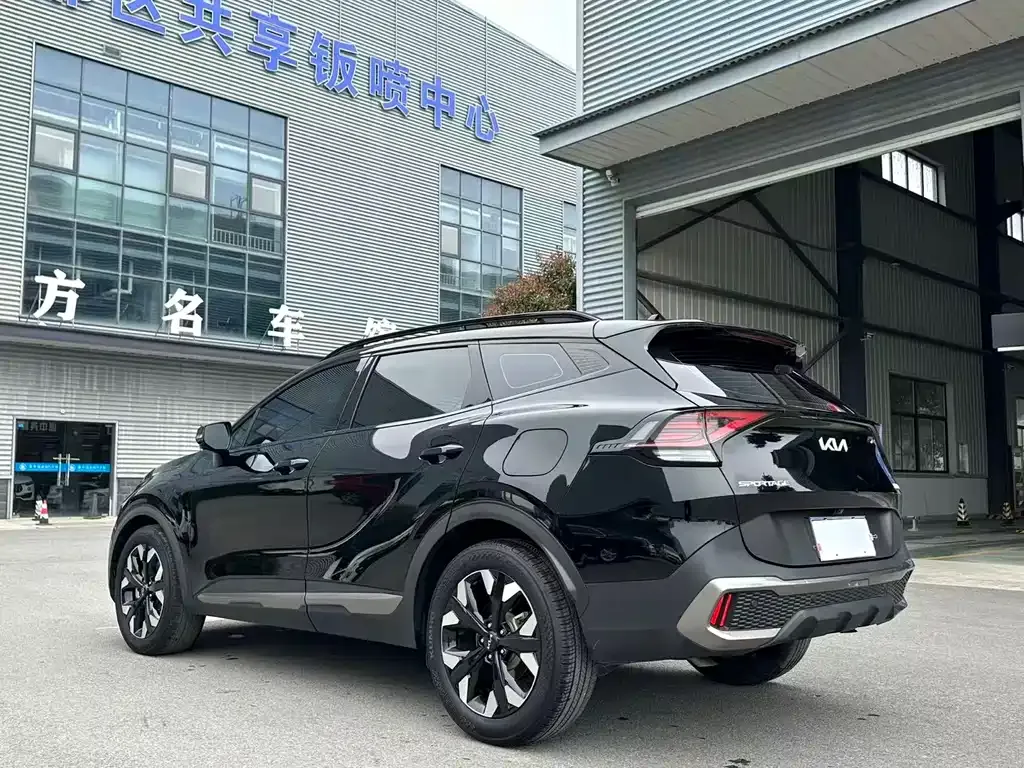Kia Sportage — фото 8
