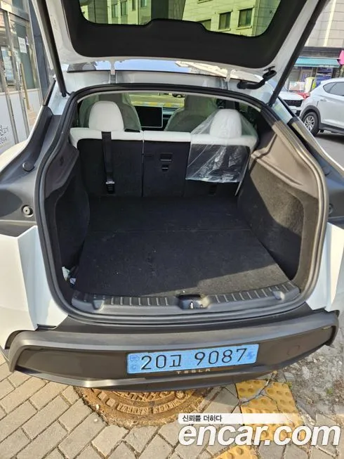 Tesla Model Y — фото 6