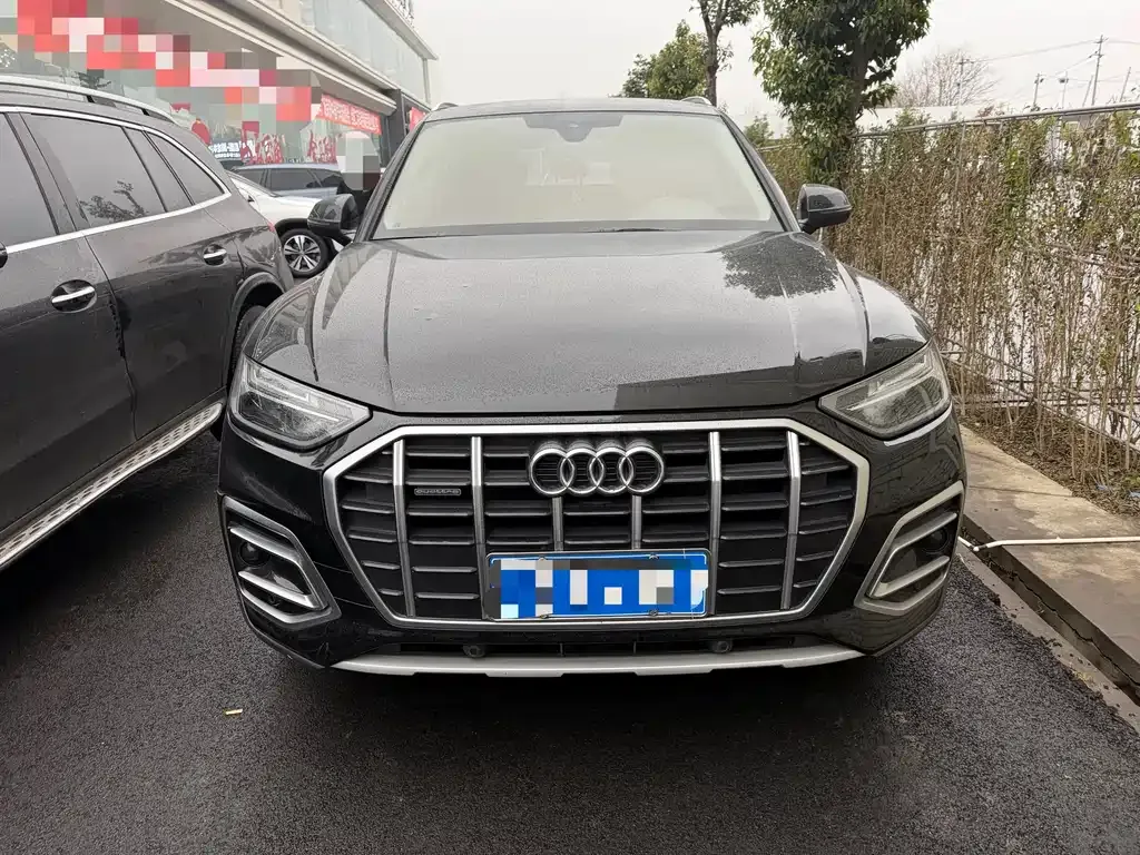 Audi Q5L — фото 7