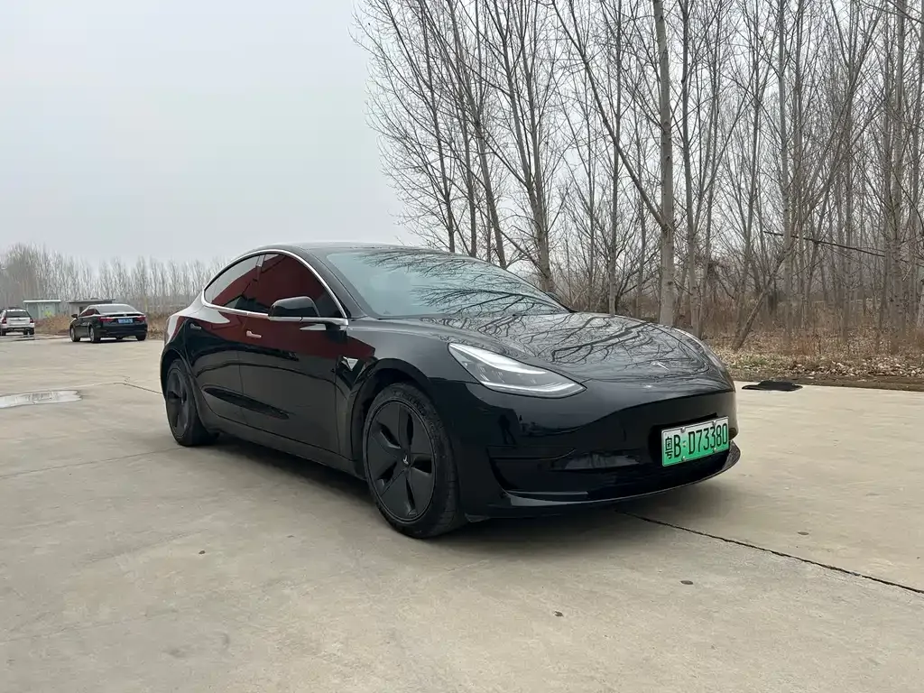 Tesla Model 3 — фото 7