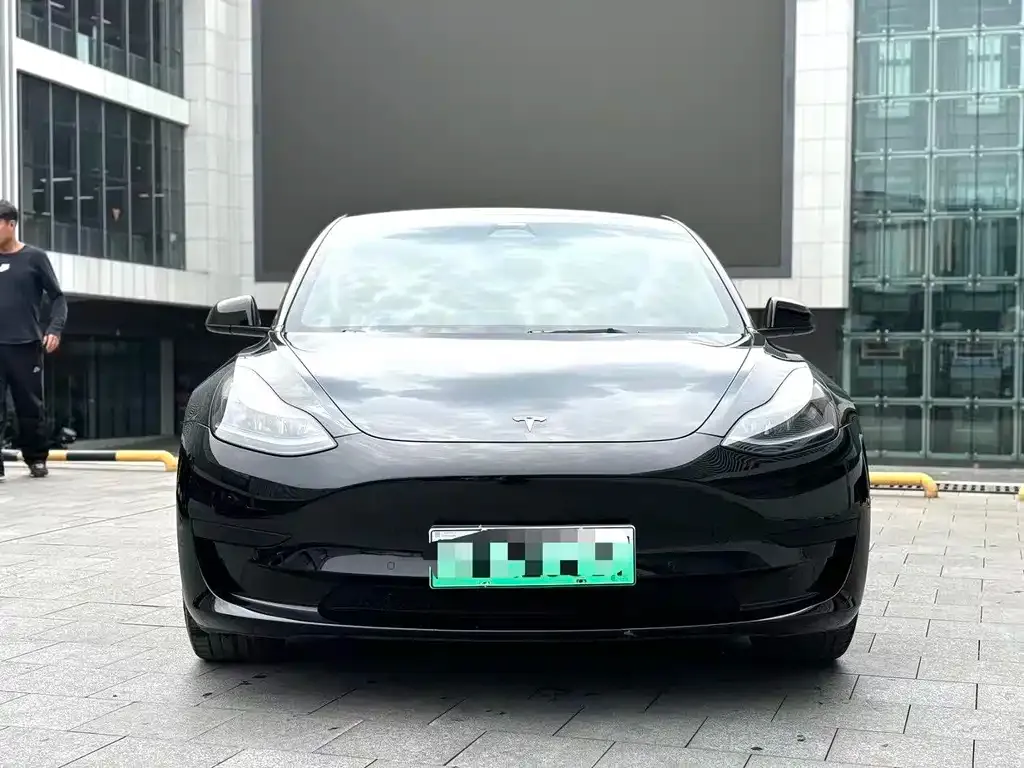 Tesla Model 3 — фото 7