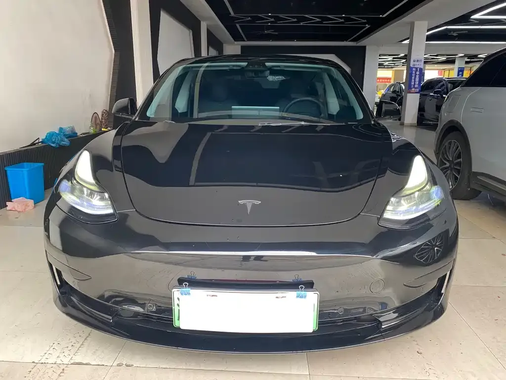 Tesla Model 3 — фото 7
