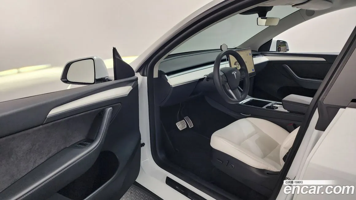Tesla Model Y — фото 6