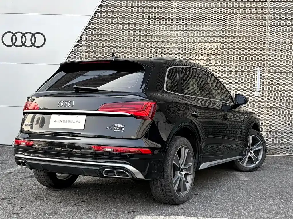 Audi Q5L — фото 7