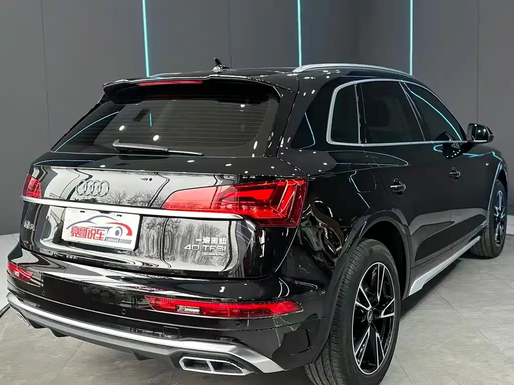 Audi Q5L — фото 9