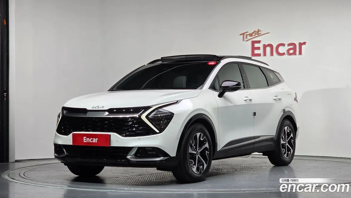 Kia Sportage — фото 1