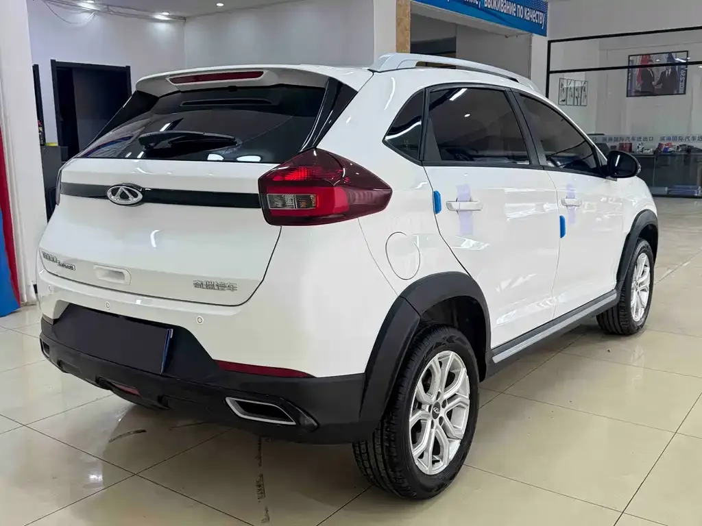 Chery Tiggo 3x — фото 10