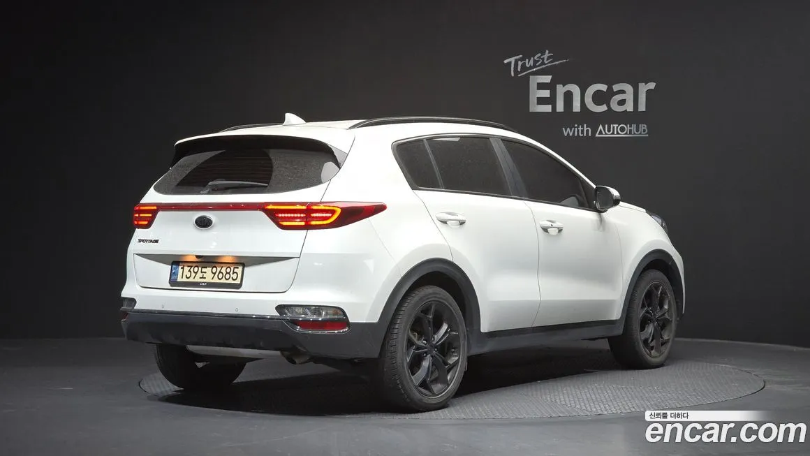 Kia Sportage — фото 10