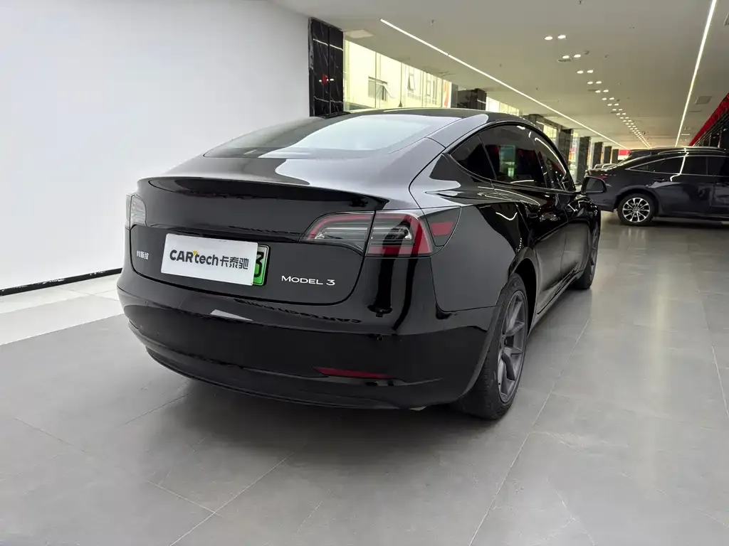 Tesla Model 3 — фото 10