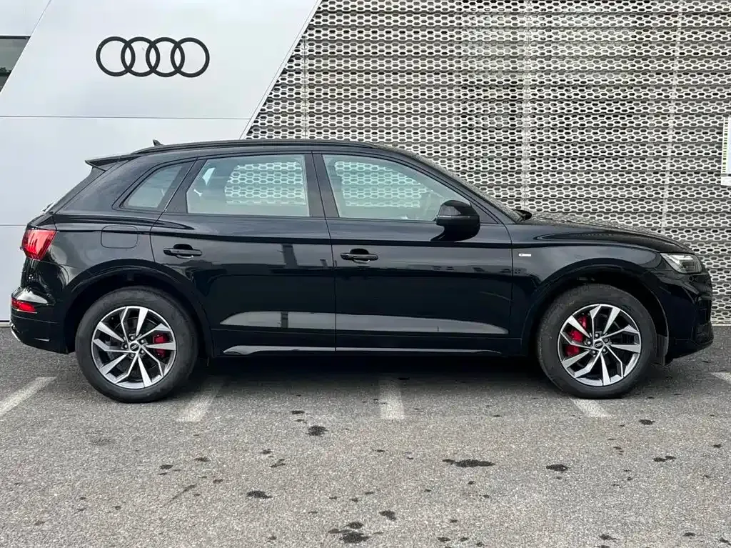 Audi Q5L — фото 5