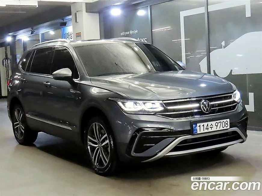 Volkswagen Tiguan — фото 1