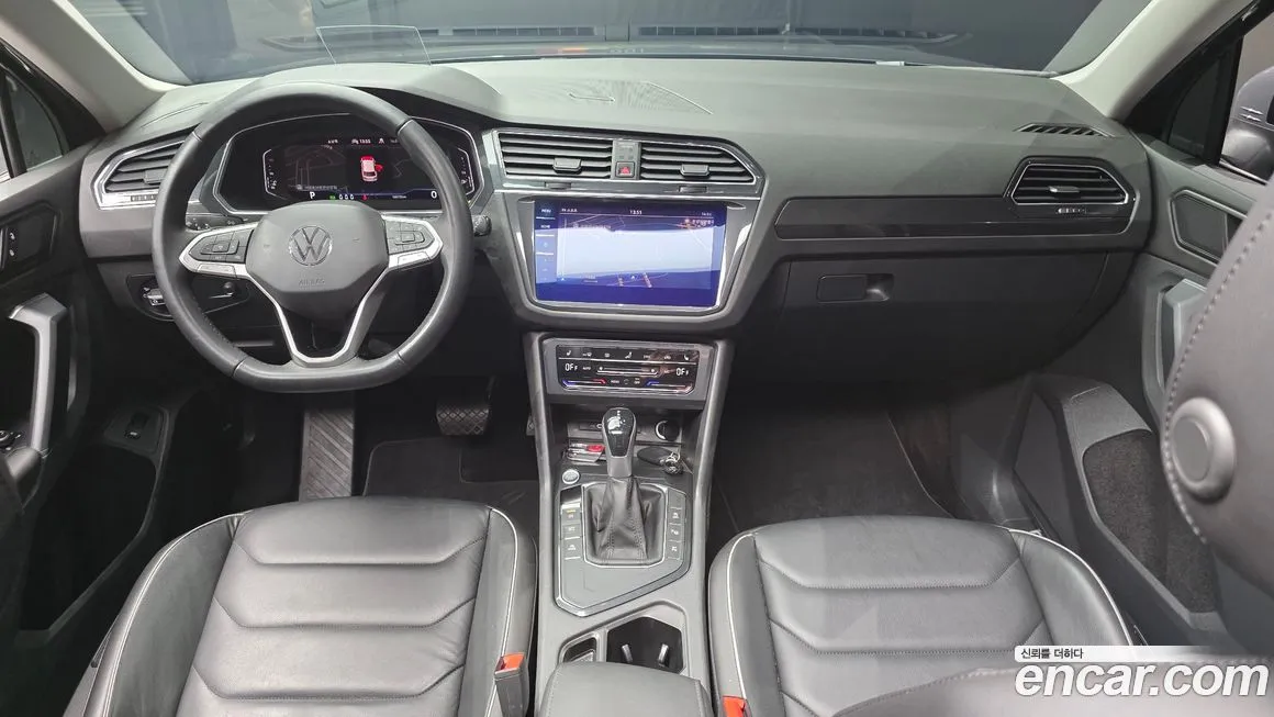 Volkswagen Tiguan — фото 10