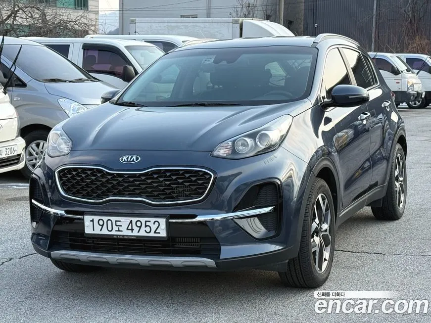 Kia Sportage — фото 1