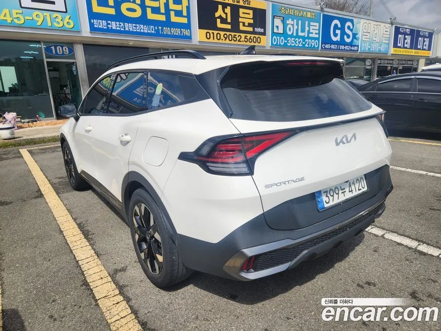 Kia Sportage — фото 10