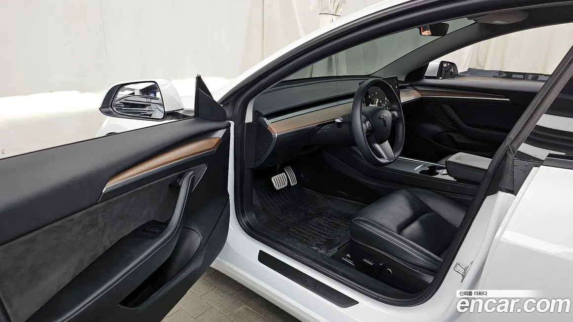 Tesla Model 3 — фото 10