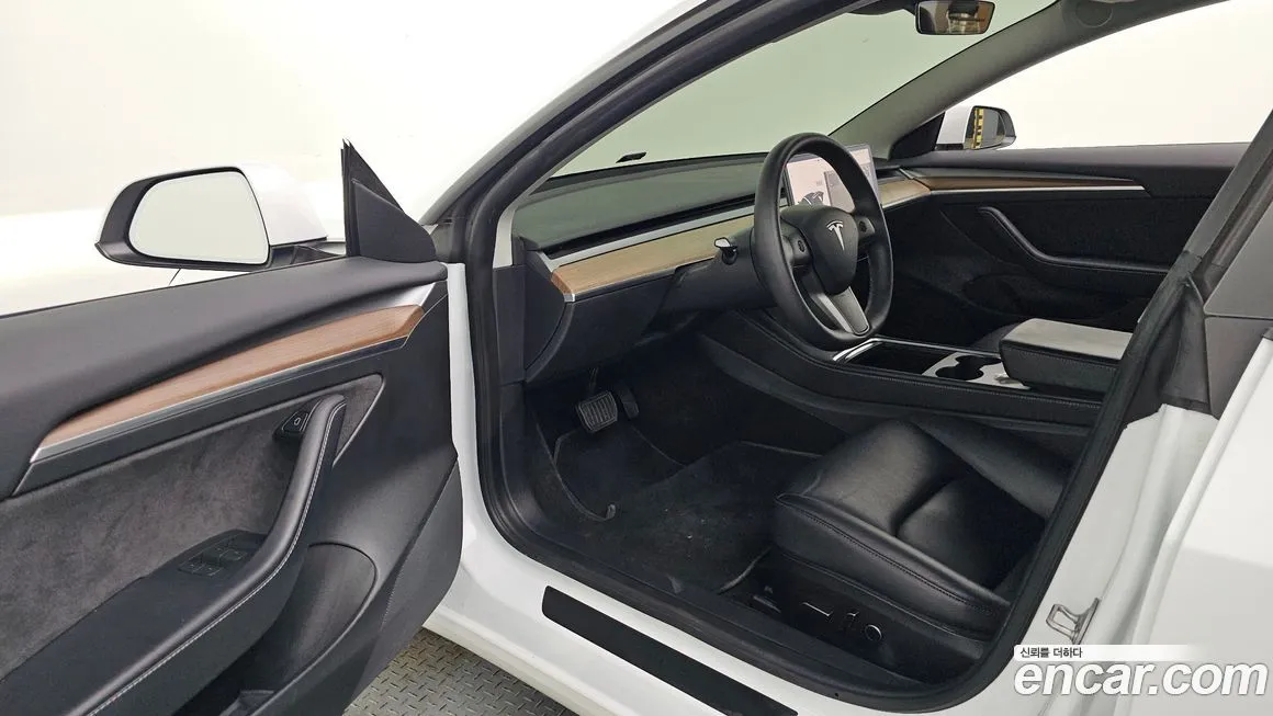 Tesla Model 3 — фото 10