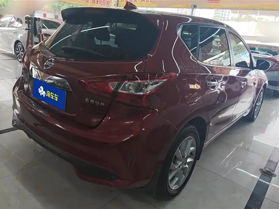 Nissan Tiida — фото 10