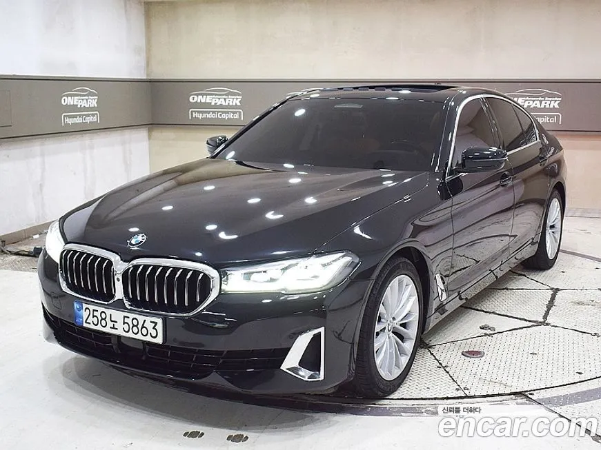 BMW 5-Series — фото 1