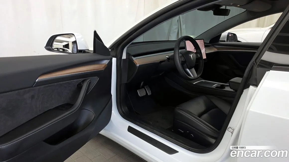Tesla Model 3 — фото 7