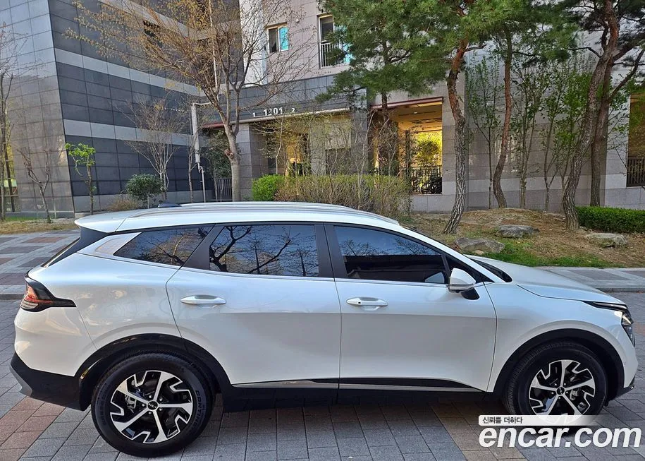 Kia Sportage — фото 7
