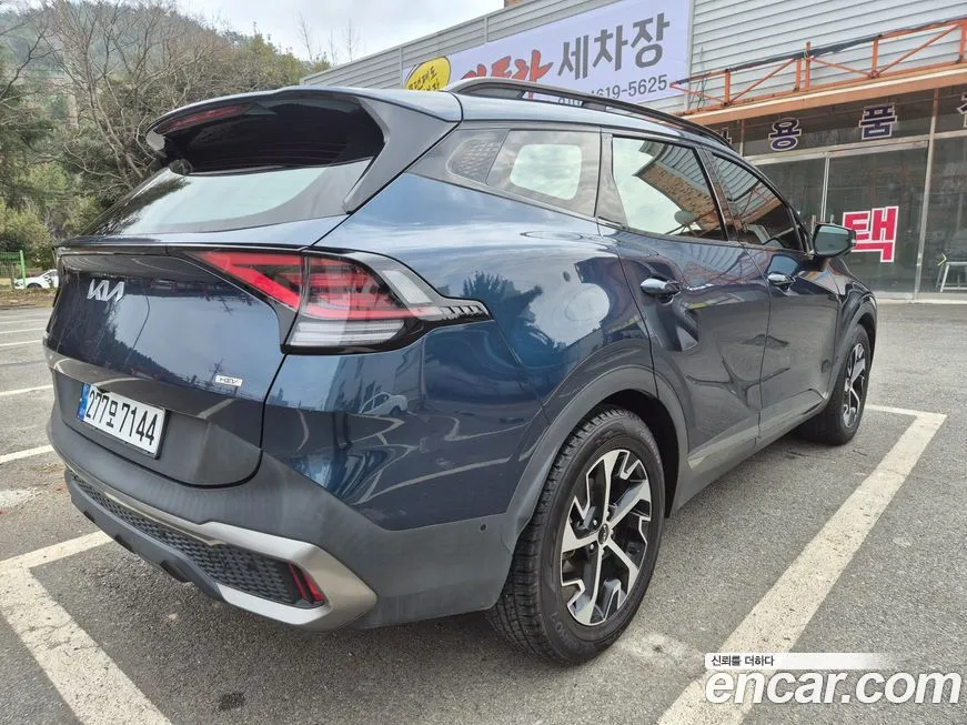 Kia Sportage — фото 10
