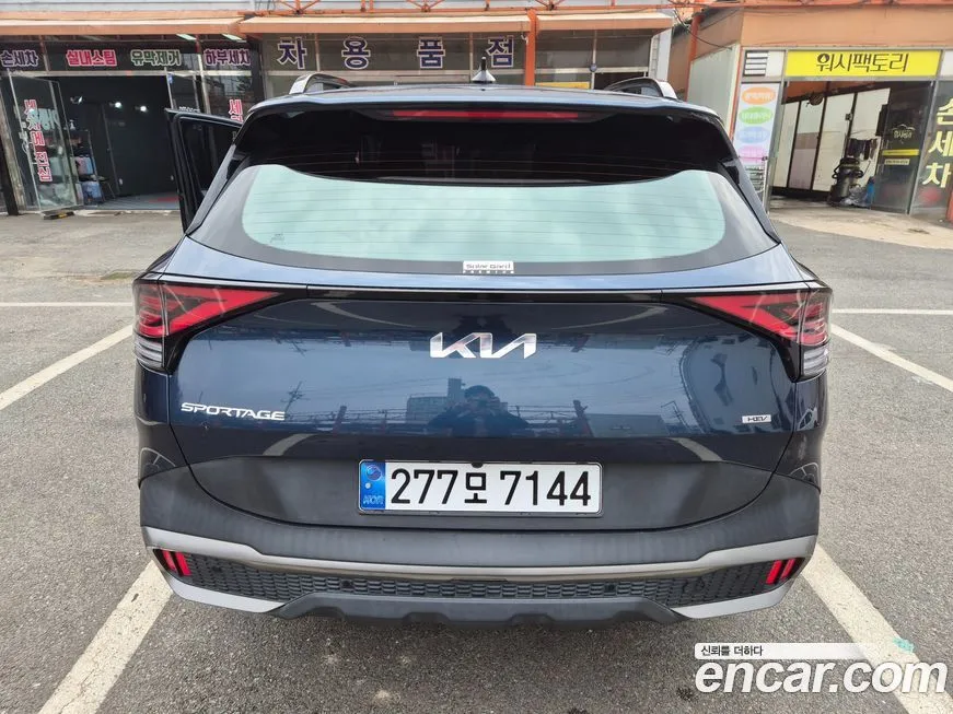 Kia Sportage — фото 6