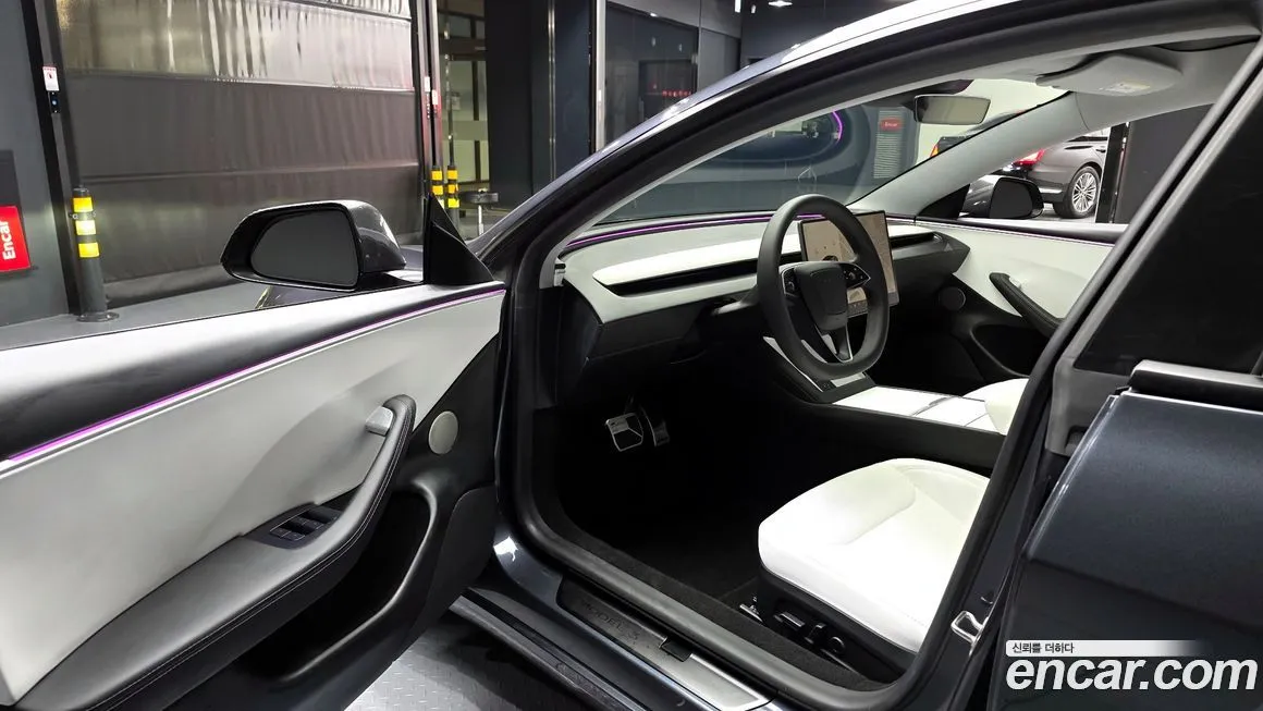 Tesla Model 3 — фото 9